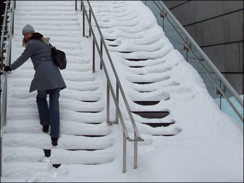 On snowy Montreal stairs