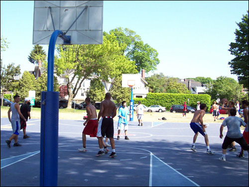 Basketball game, court across from Kits Beach